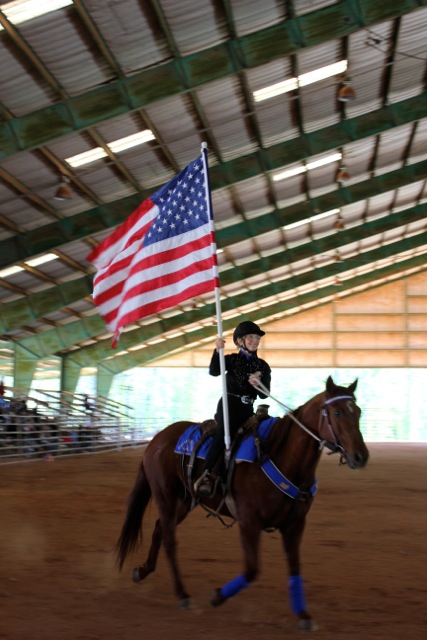 deenie mckeever's first ride, carrying flag 