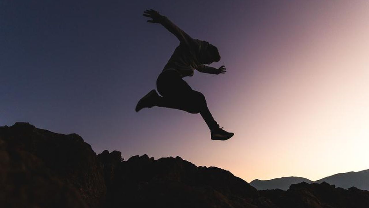 jumping sunset