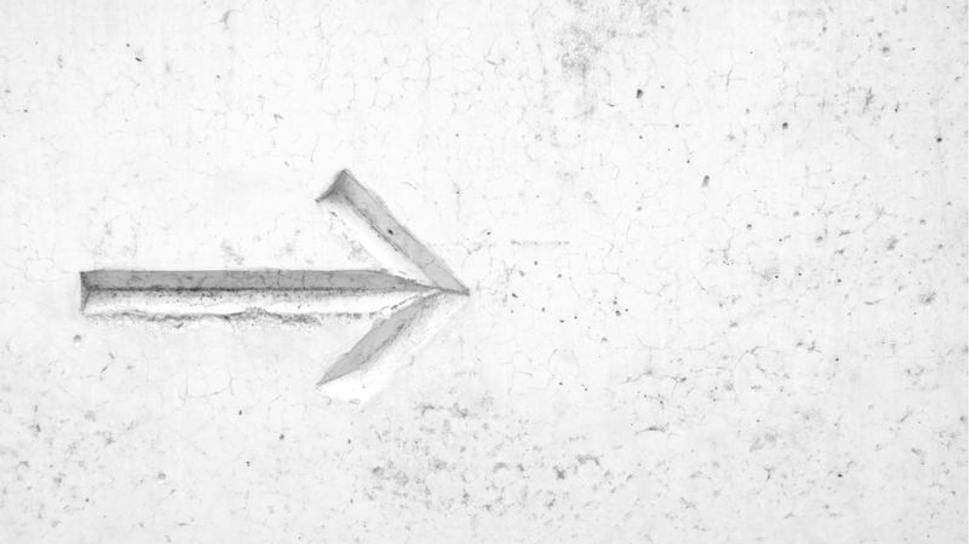 arrow in the white sand