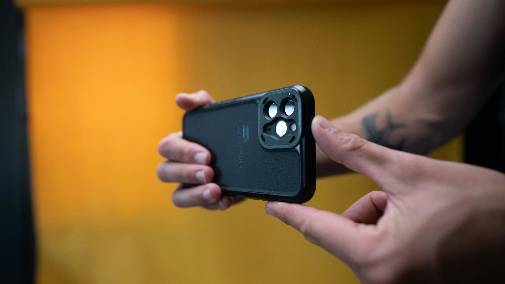 person using phone to record a video
