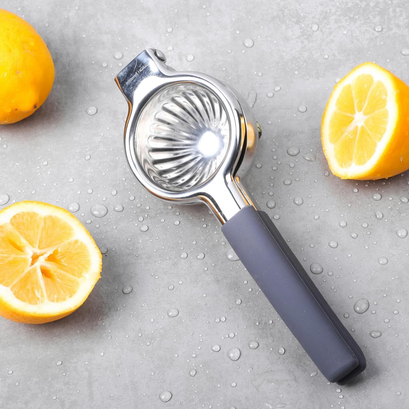 orange squeezer on table