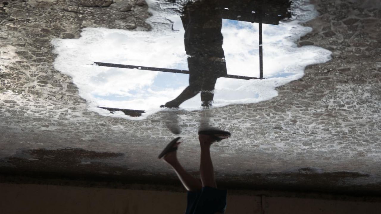 person, water mirror, outdoors